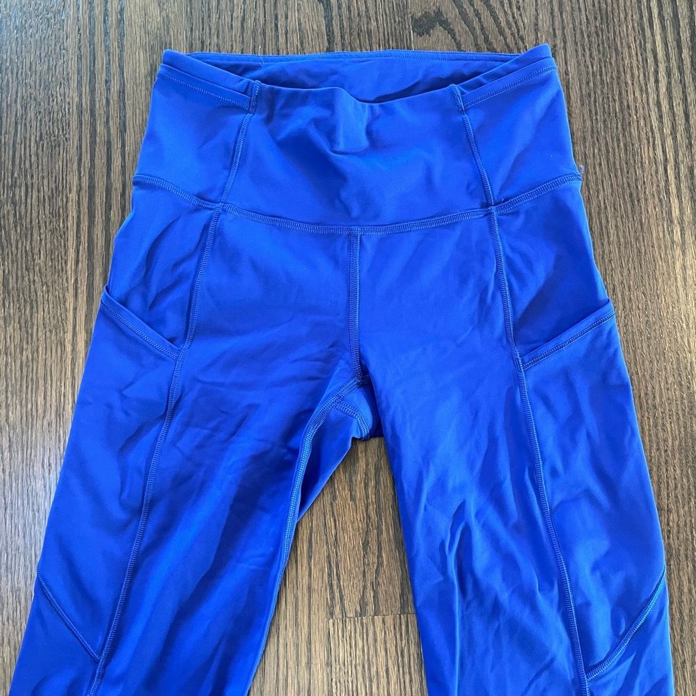 Lululemon women’s shorts spandex Blue longer raw hem size 4